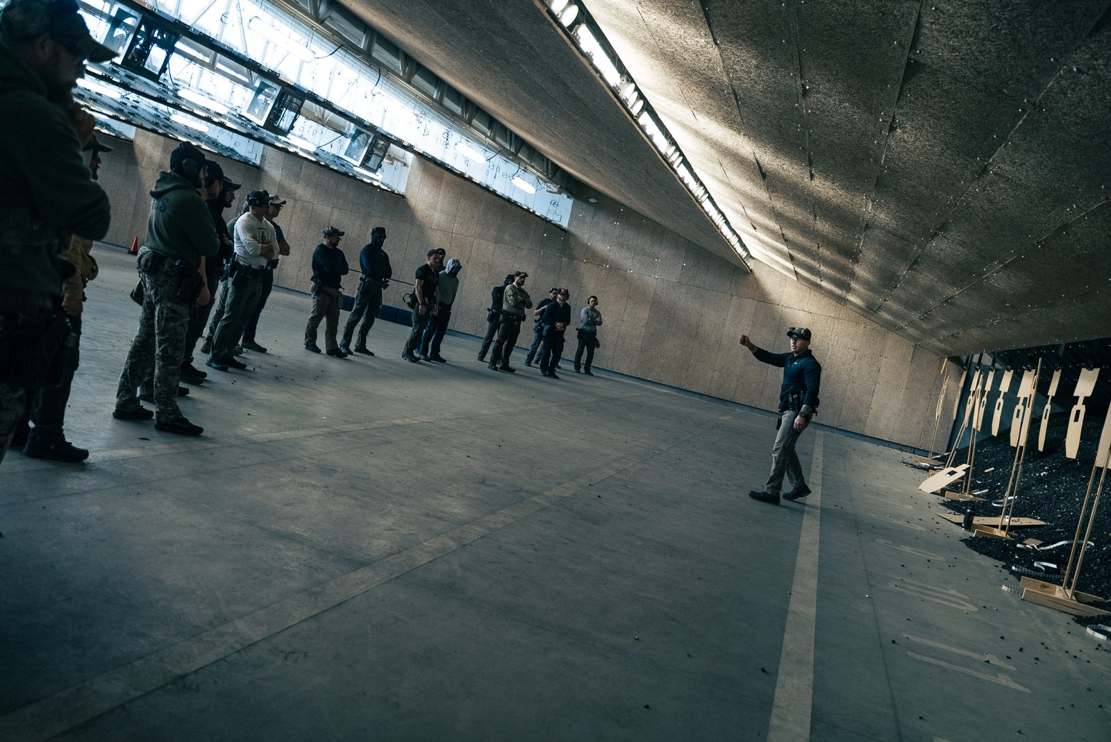 Achilles Heel Tactical instructor briefing students on the firing line at Georgetown Texas Police Department