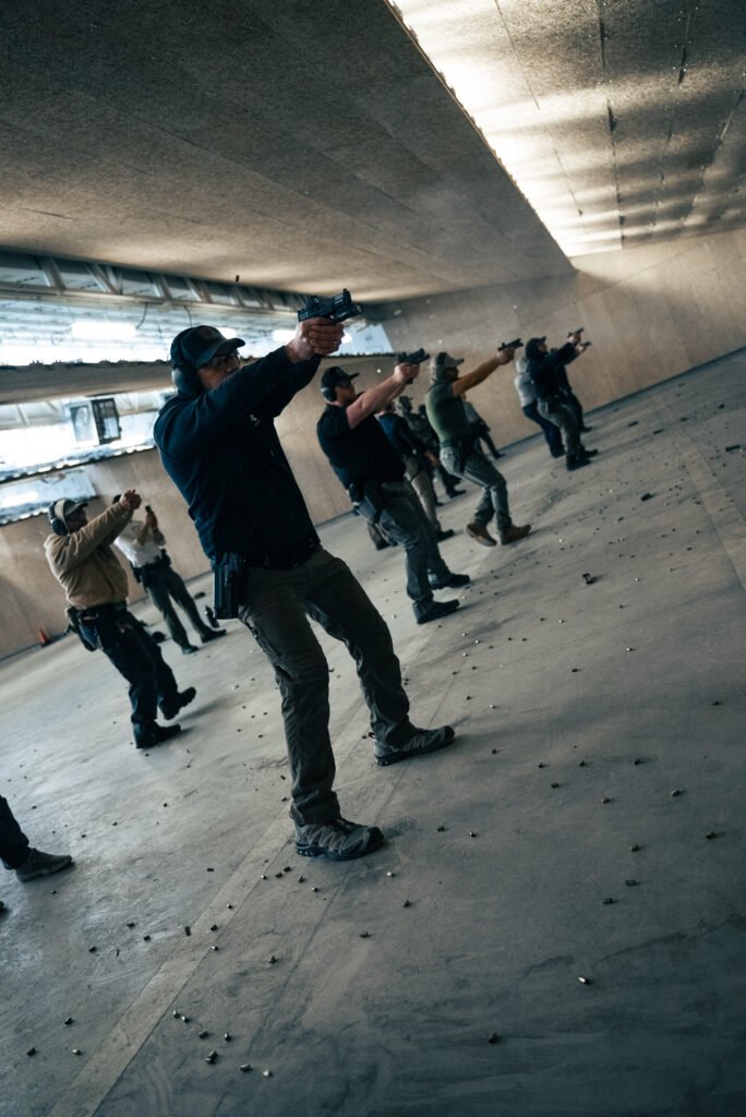Students running pistol drills during Achilles Heel Tactical Performance Baseline Pistol course